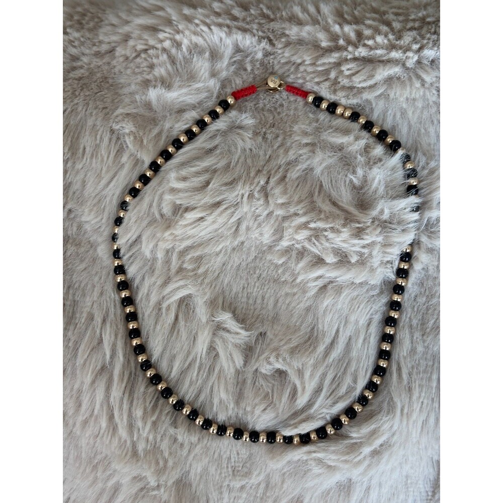 Roxanne Assoulin Black & Gold Beaded Necklace Gold Tone Macrame Slider NWOT - Picture 2 of 5